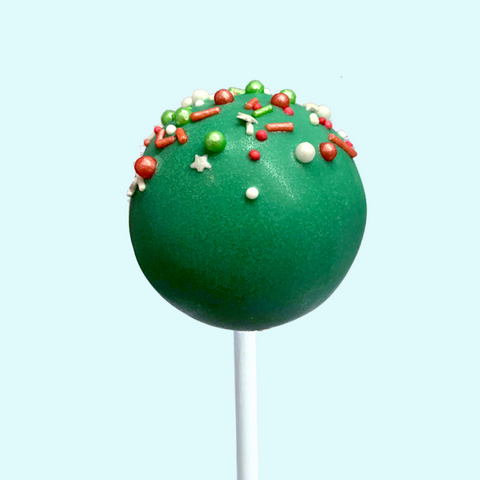 Green Christmas sprinkle cake pop coated in festive green candy and sprinkles