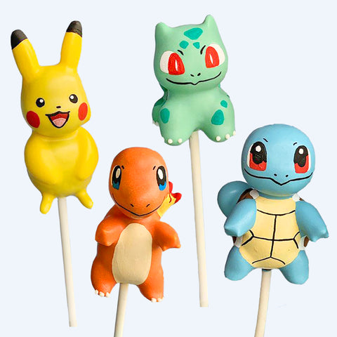 Group of cute creature cake pops featuring colourful handmade character designs