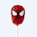 Close-up of a web warrior cake pop with detailed candy melt finish.